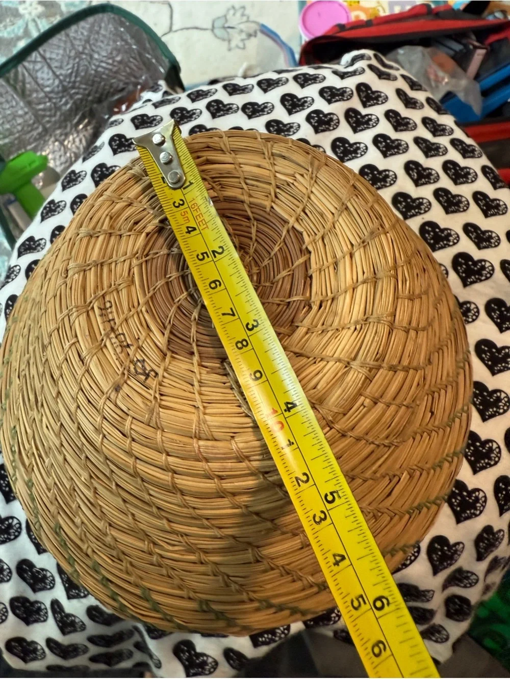 vintage Native American style pine needle basket, similar to those identified